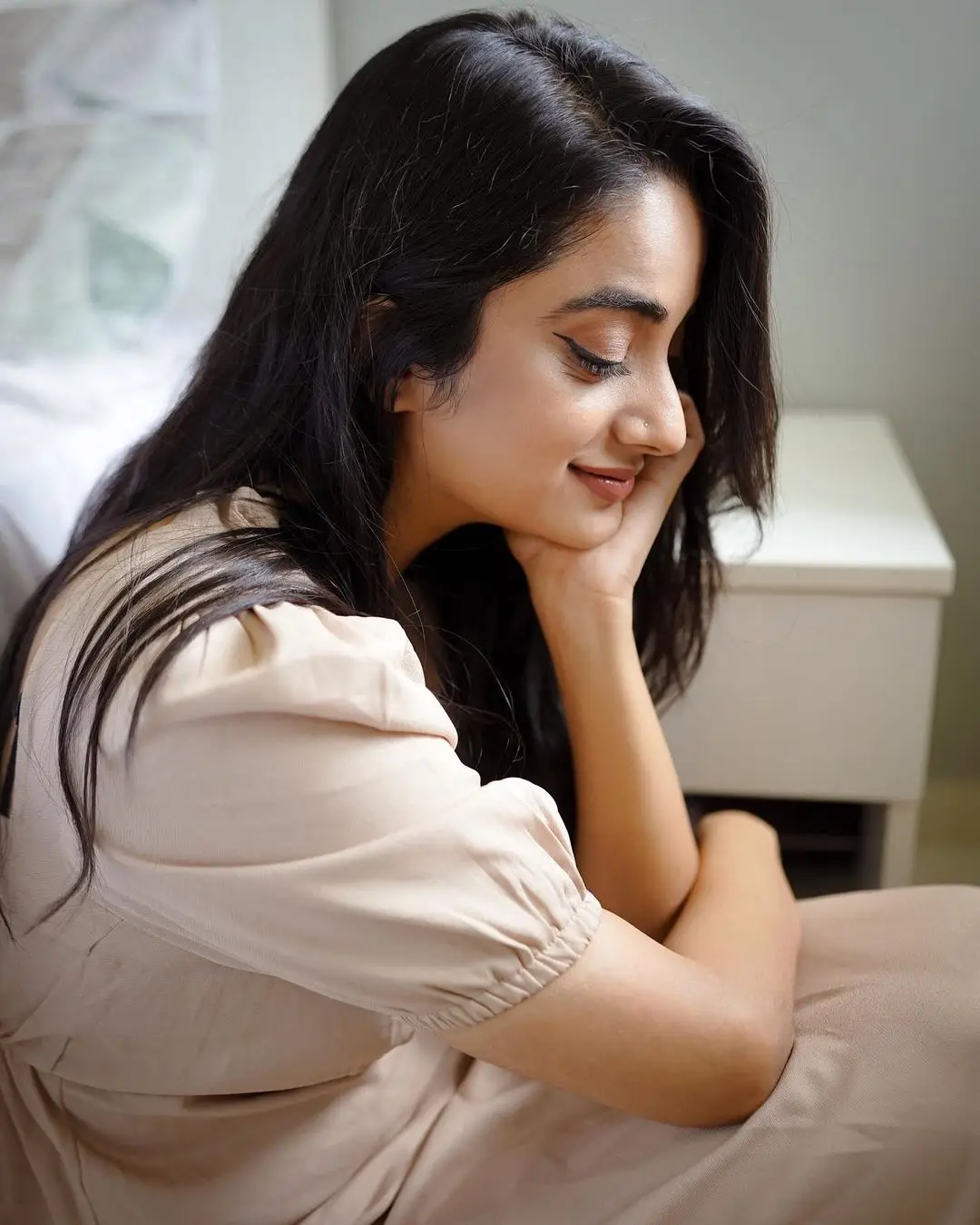 Namitha Pramod Long Hair Stills in White Dress